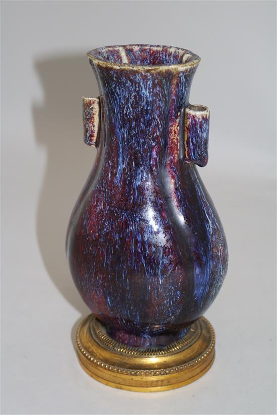 A Chinese flambe-glazed arrow vase, 18th/19th century, total height 21.7cm, faults